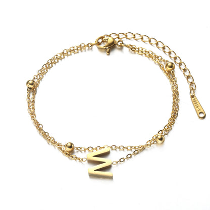 Pulsera con cadena y letras de acero de titanio de doble capa